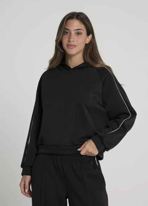 Buzo deportivo con vivo en manga 