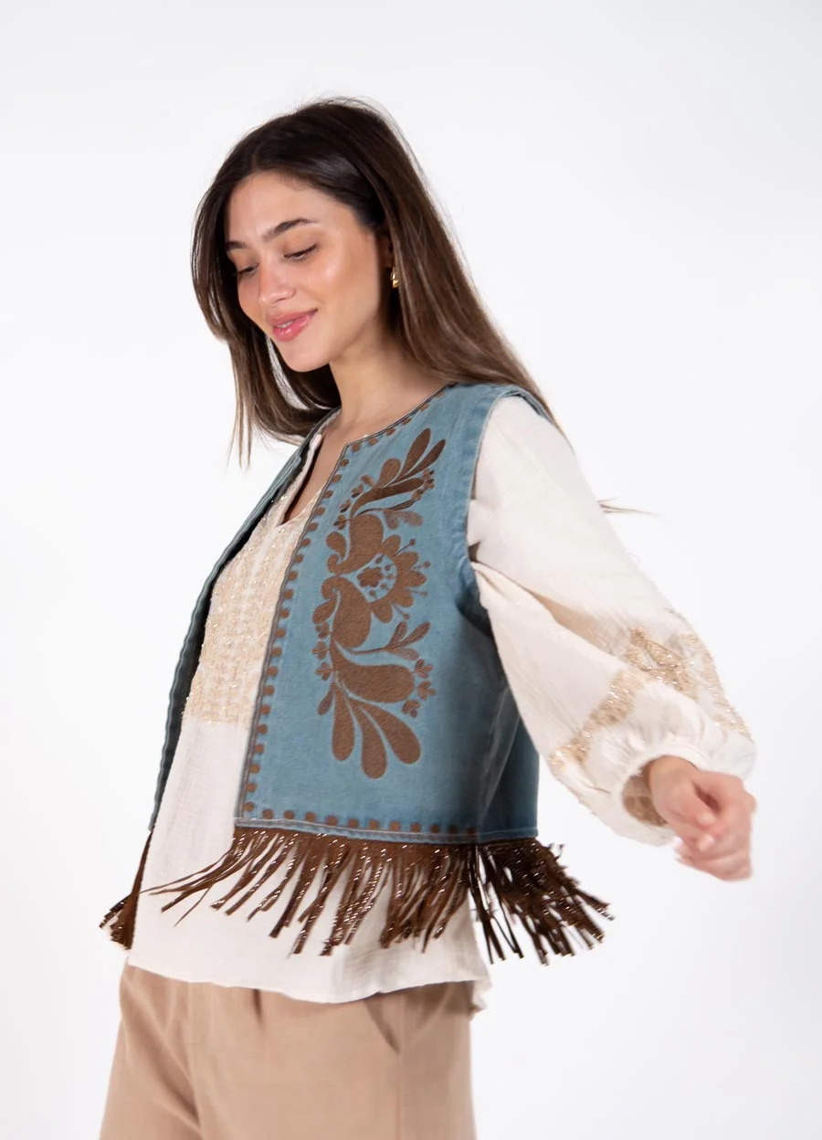 Chaleco denim con flecos 