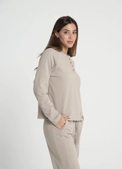 Buzo con botones tejido rustico 