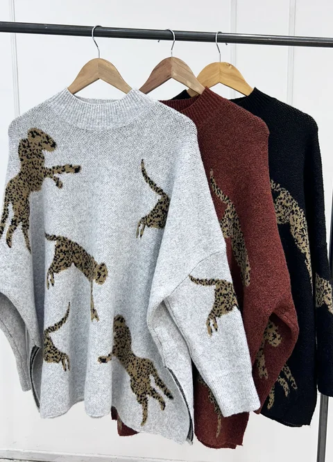 Maxi sweater leopardos con tajos 