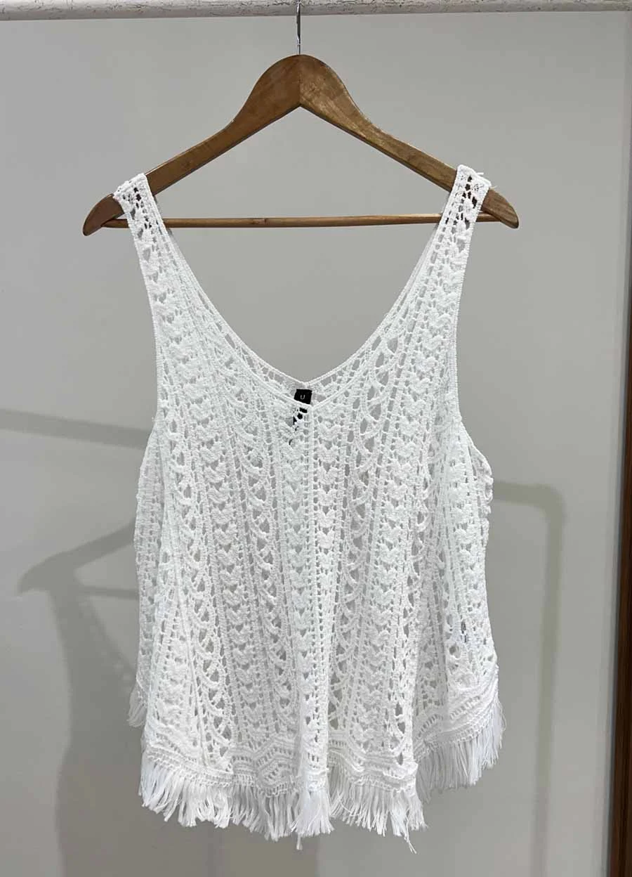 Musculosa tejida con flecos