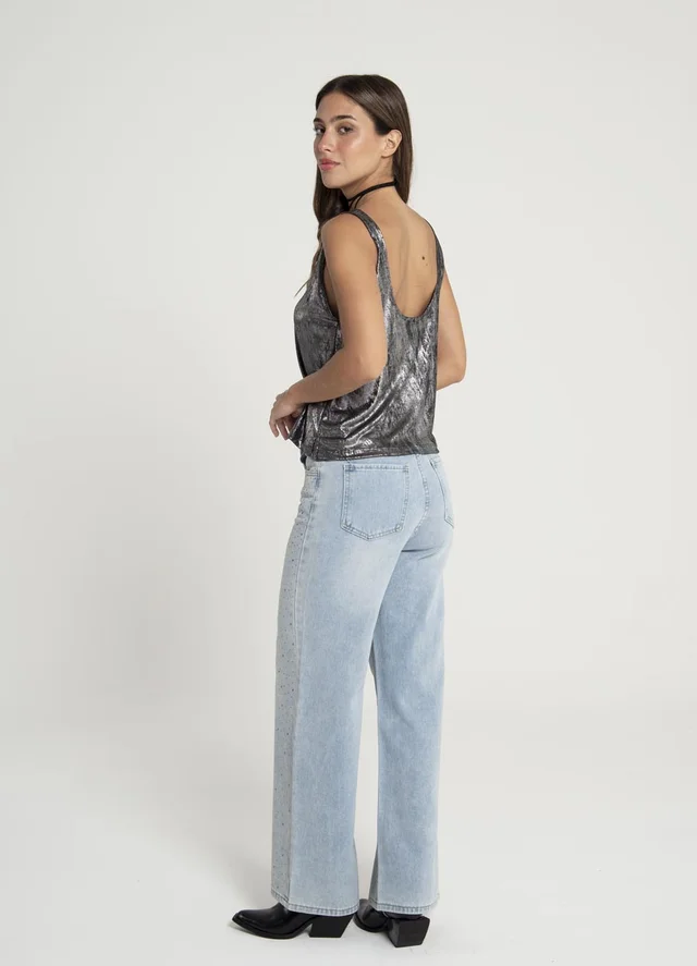 Musculosa metalizada con tajitos