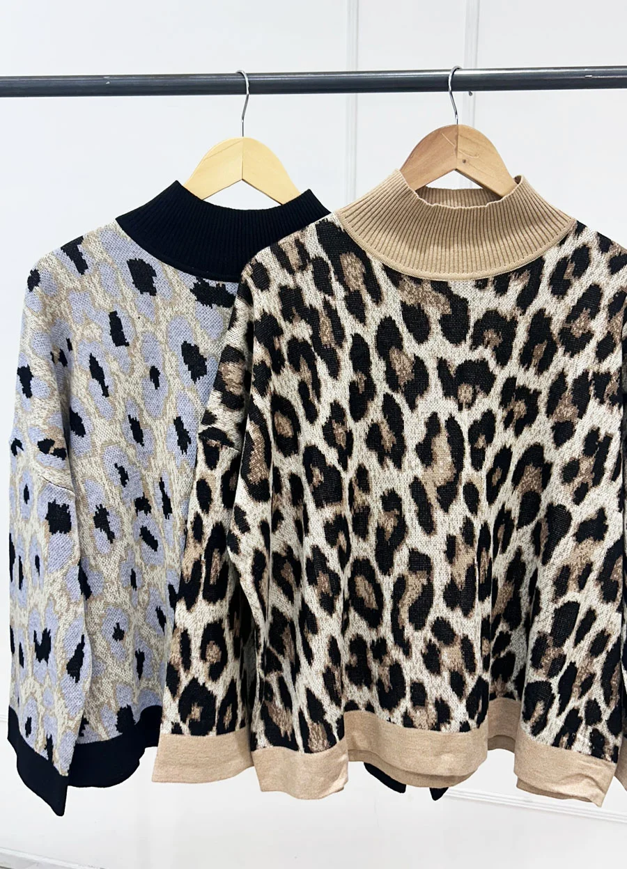 Sweater print con puños 