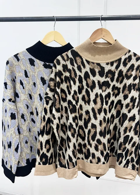 Sweater print con puños 