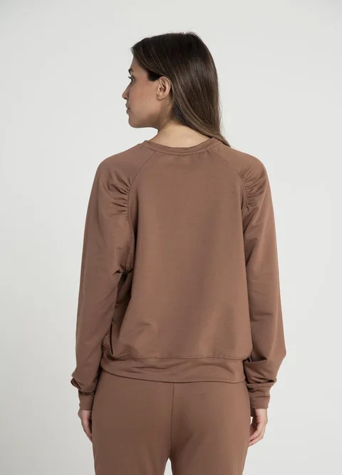 Buzo rustico con spandex y frunce en hombro