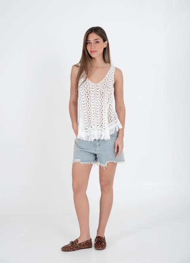 Musculosa tejida con flecos