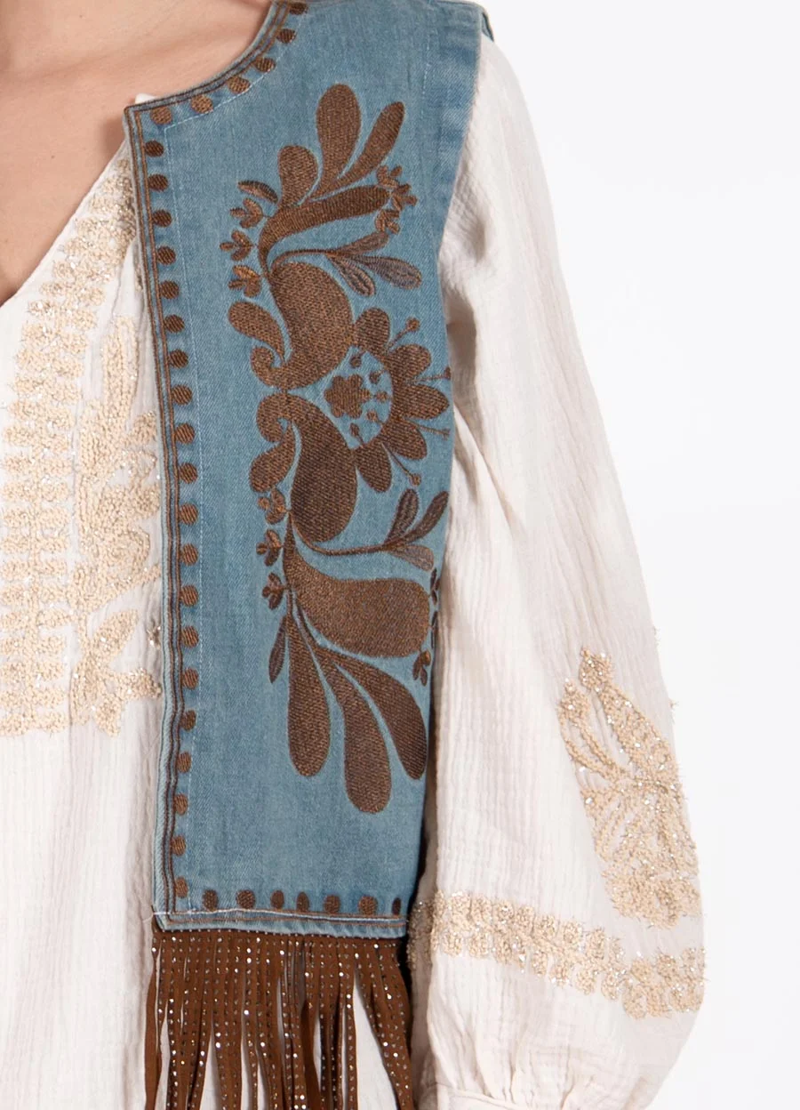 Chaleco denim con flecos 