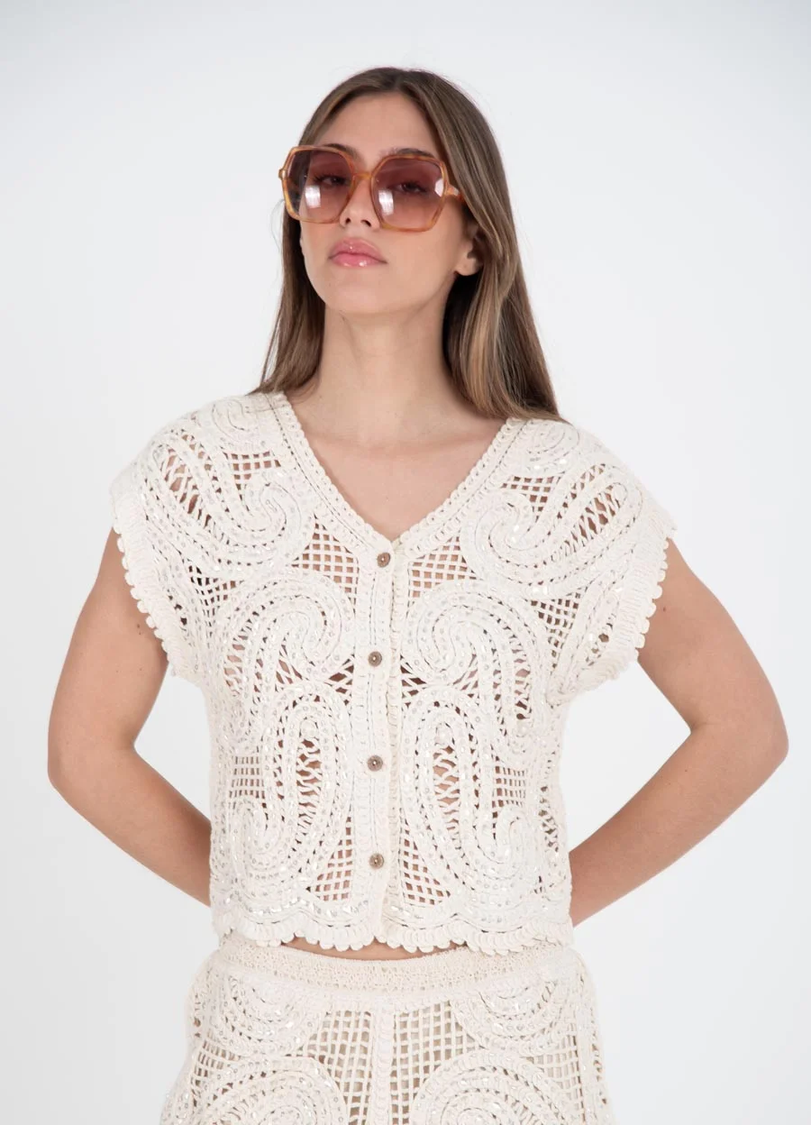 Musculosa tejida arabescos con lentejuelas 