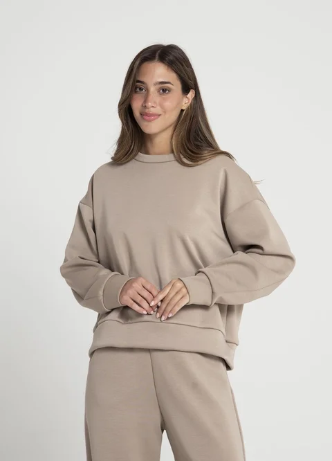 Buzo deportivo con puño recorte en espalda 