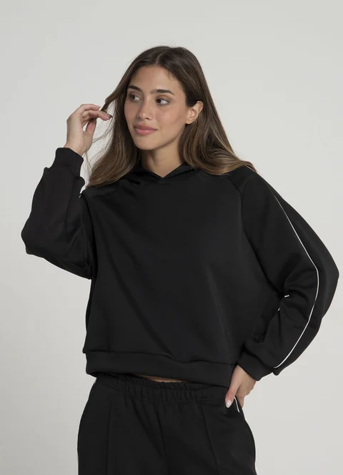 Buzo deportivo con vivo en manga 