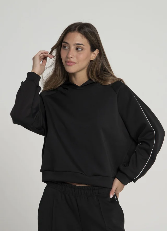 Buzo deportivo con vivo en manga 