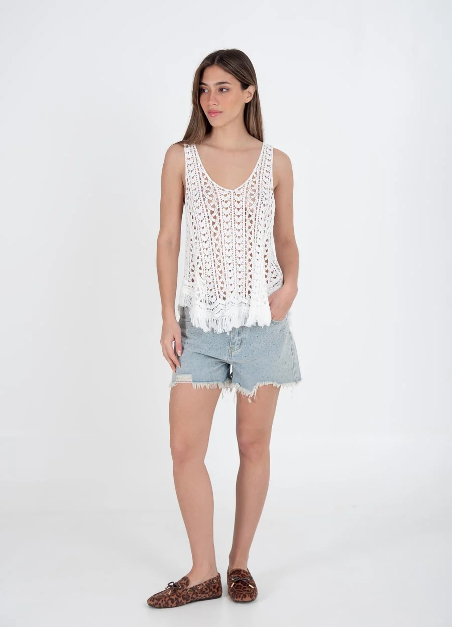 Musculosa tejida con flecos