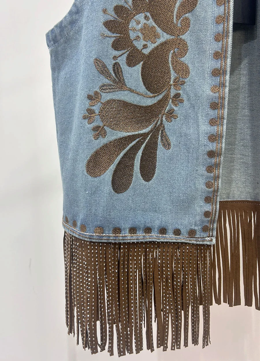 Chaleco denim con flecos 