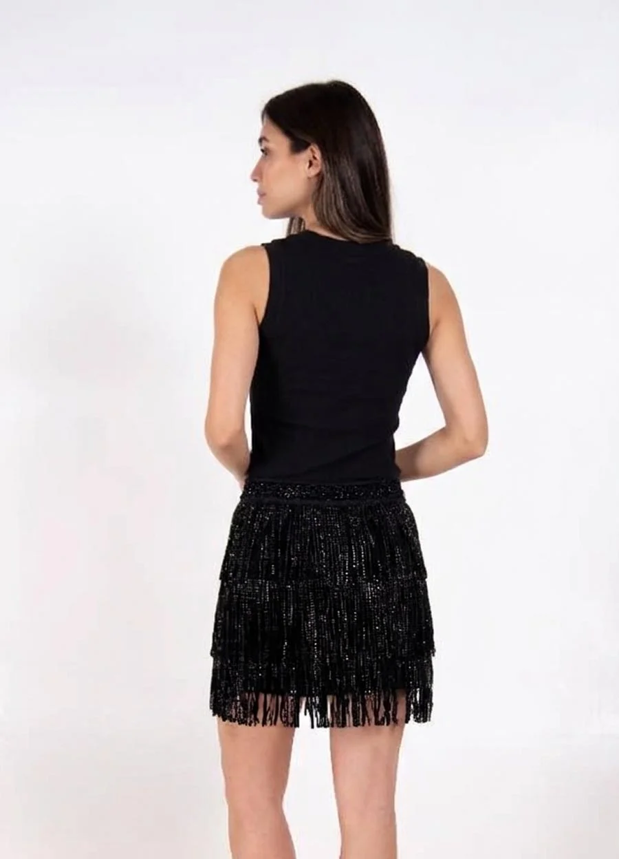 Musculosa con strass en ruedo en sisa 