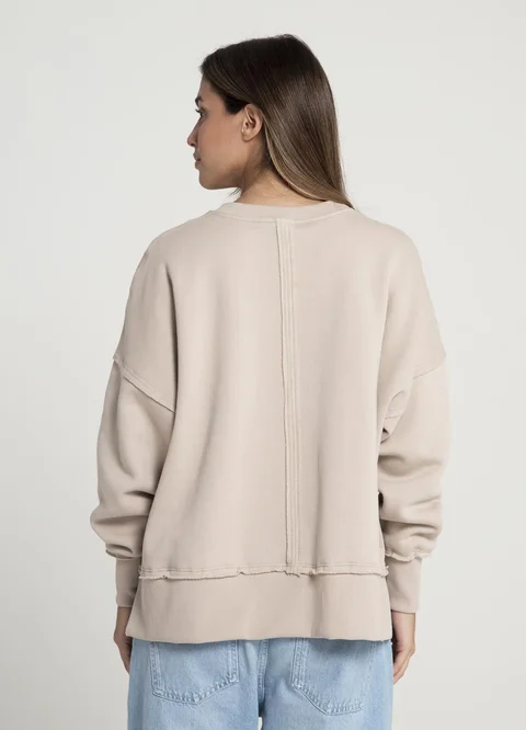 Maxi buzo con frisa con recortes y tajo 