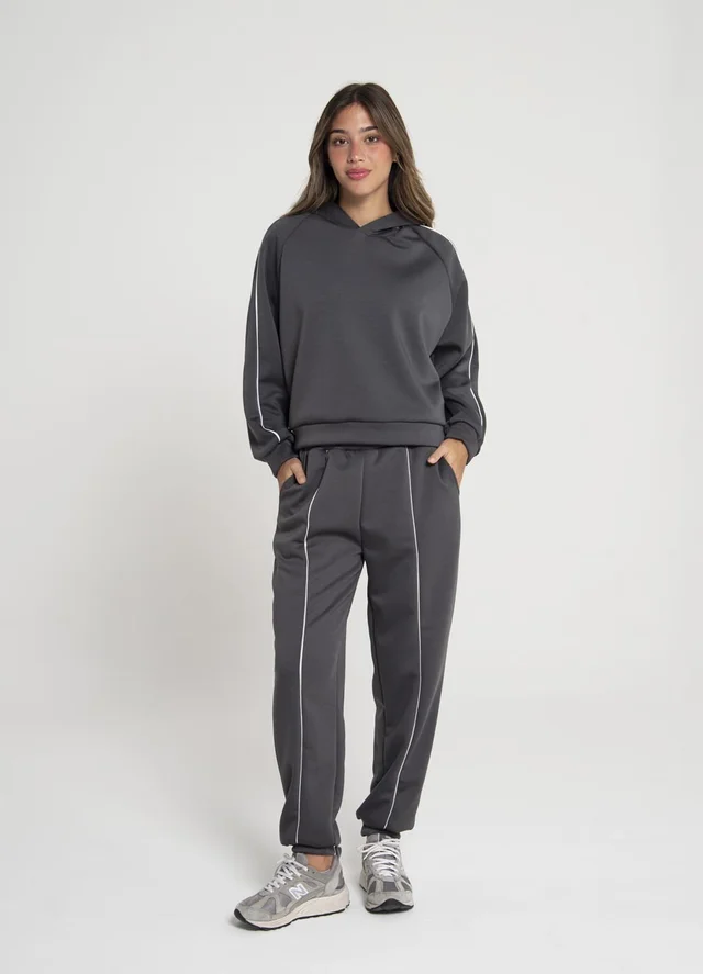 Babucha deportiva con vivo y puño 