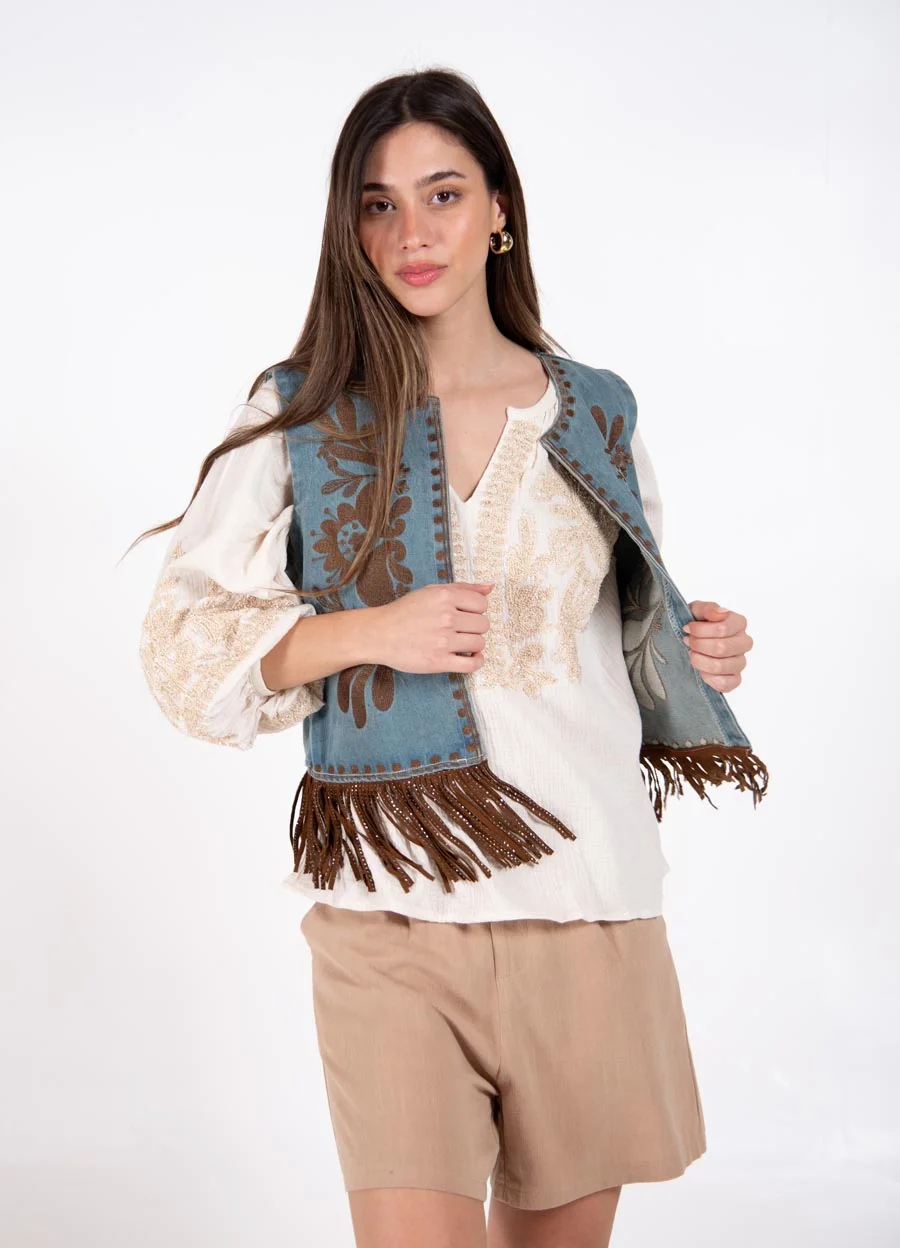Chaleco denim con flecos 