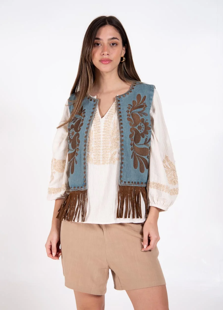 Chaleco denim con flecos 