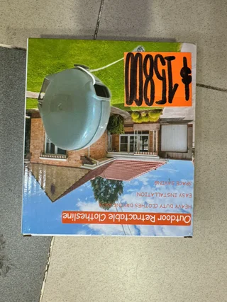 OUTDOOR RETRACTABLE CLOTHESLINE - Vista 1