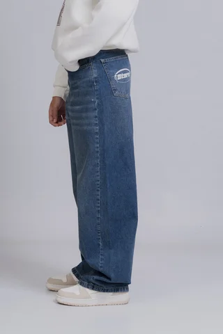 Jean Baggy Lira Matizado Con Pinzas, Corte Amplio Y Estampado Star En Bolsillo T - Vista 1