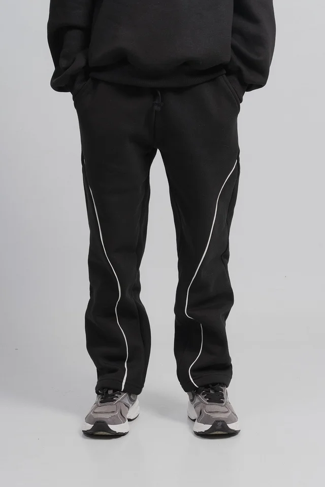 Jogger Dex Oversize De Frisa Con Recorte Y Vivo En Contratono.