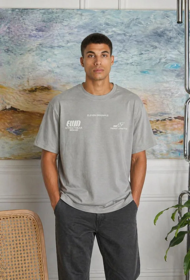 85407 - REMERA ELVN ORIGINALS BERLIN 24/1 DOBLE ESTAMPA
