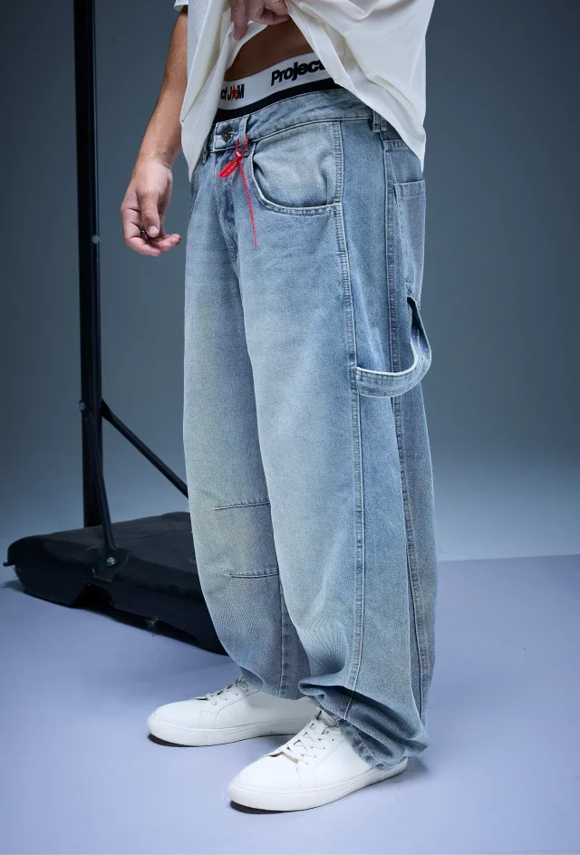 3006 - JEAN BAGGY AZUL CLARO TIRA CARPINTERA