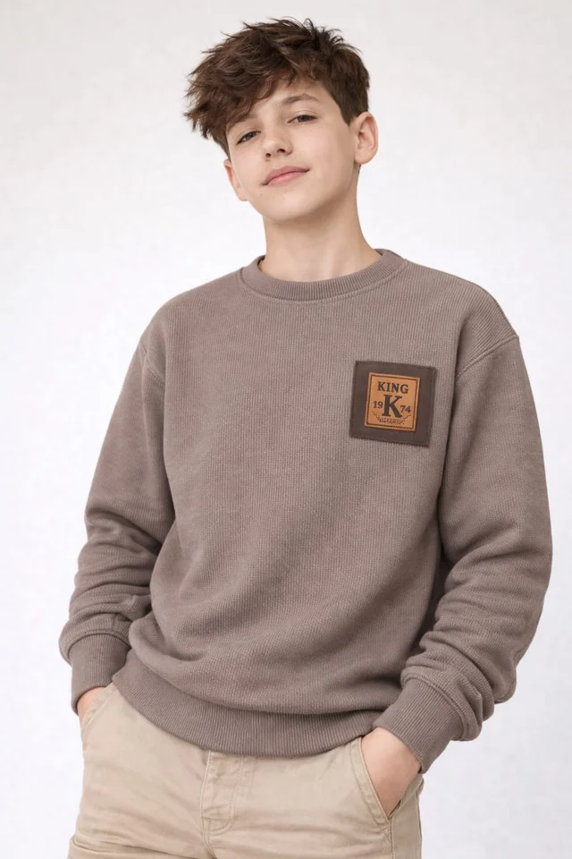 Buzo teen de darlon morley con interior de patagonia, bien abrigado, con aplique combinado