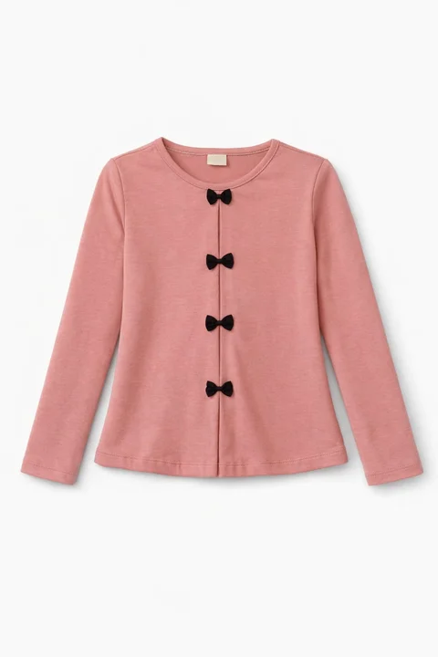 Remera manga larga de nena con pliegues y moños aplicados