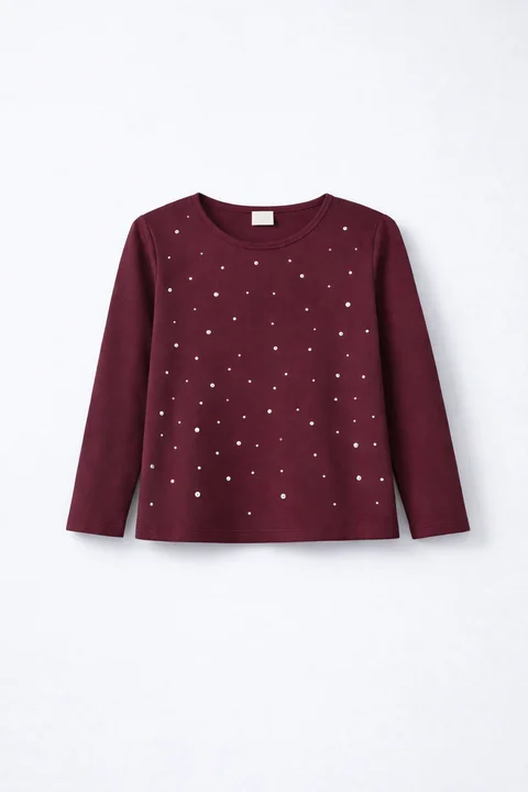 Remera manga larga de nena con aplique de hotfitt brillante 