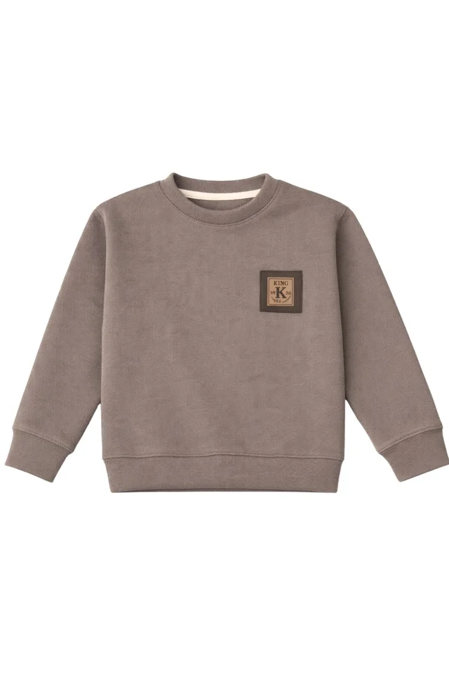 Buzo teen de darlon morley con interior de patagonia, bien abrigado, con aplique combinado