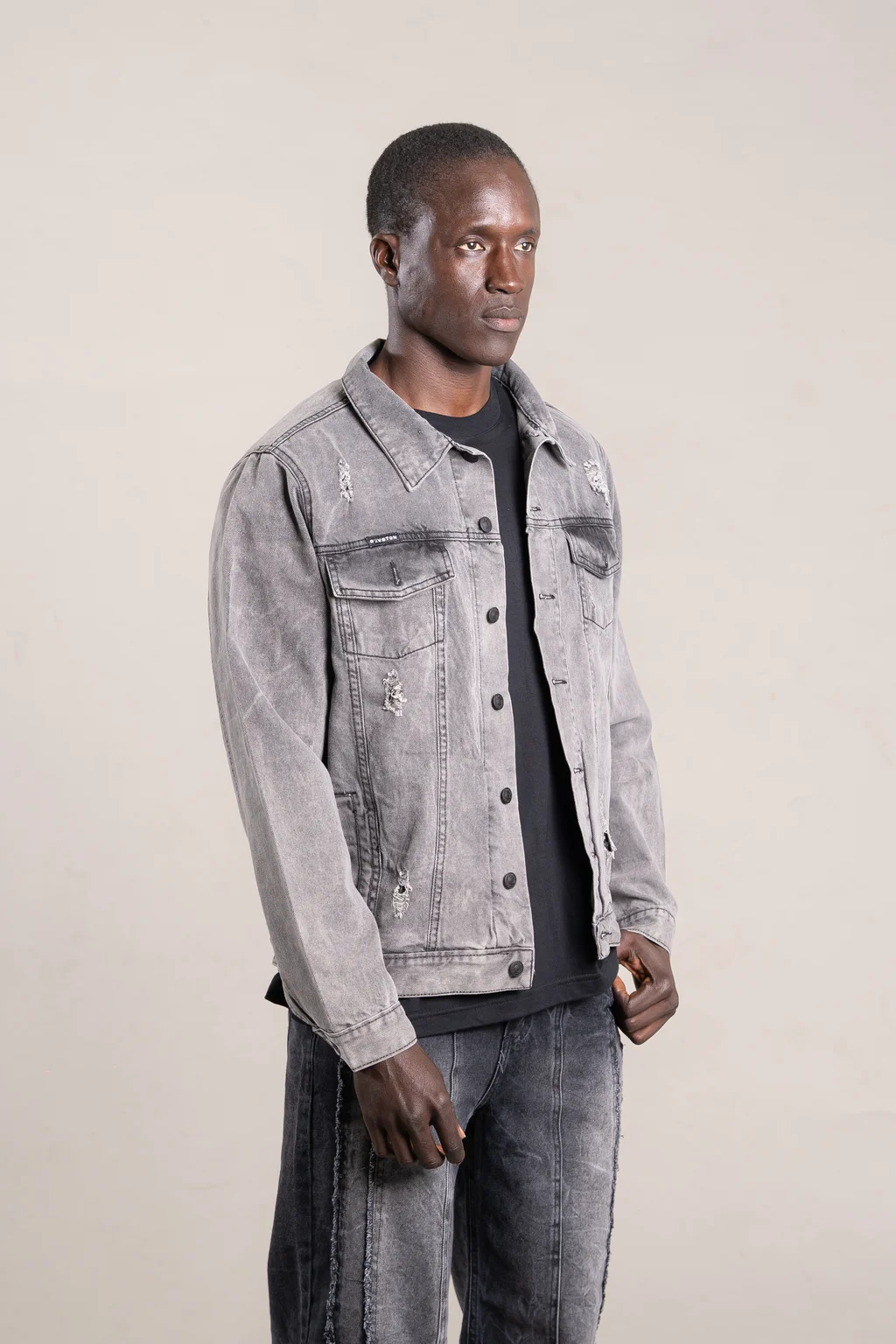 14A - CAMPERA GRIS C/ROTURAS
